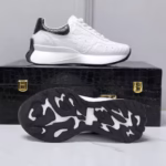 White crocodile skin sneakers