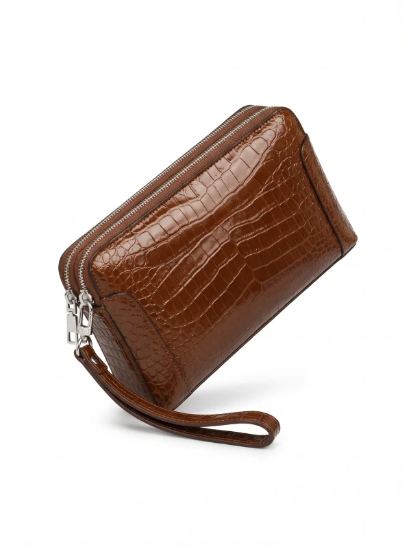 Brown Bramshaw Crocodile Travel Clutch, three-quarter view